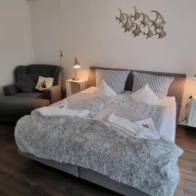 Ein Bett oder Betten in einem Zimmer der Unterkunft Haus Kaiser Ferienwohnung und Appartementvermietung