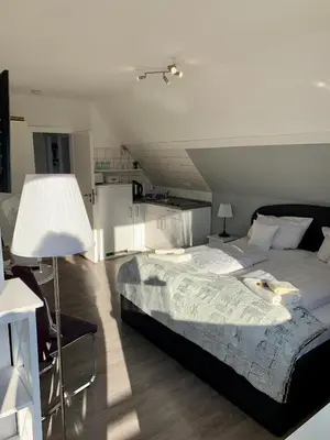 Ein Bett oder Betten in einem Zimmer der Unterkunft Haus Kaiser Ferienwohnung und Appartementvermietung