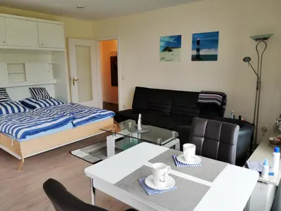 Ein Bett oder Betten in einem Zimmer der Unterkunft TOP Lage, FeWo an der Familienlagune Hundestrand