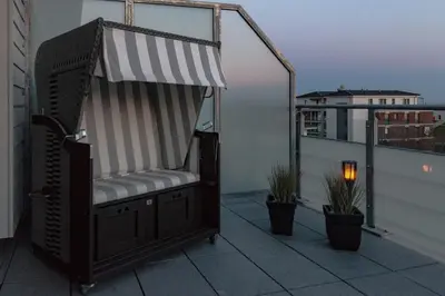 Ein Balkon oder eine Terrasse in der Unterkunft 5 Sterne Penthouse DeichSuite