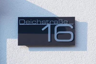 Ein Zertifikat, Auszeichnung, Logo oder anderes Dokument, das in der Unterkunft Deichresidenz Büsum ausgestellt ist