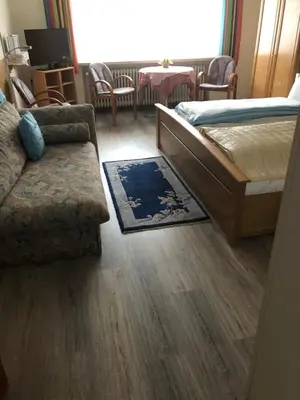 Ein Bett oder Betten in einem Zimmer der Unterkunft HausTanneneck