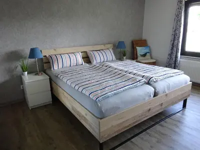 Ein Bett oder Betten in einem Zimmer der Unterkunft Ferienwohnung Schwiemann, Erdgeschoss