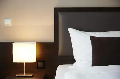 Ein Bett oder Betten in einem Zimmer der Unterkunft nordica Hotel Friesenhof