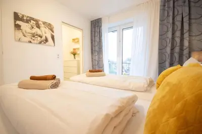 Ein Bett oder Betten in einem Zimmer der Unterkunft Marina View