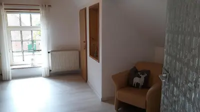 Ein Sitzbereich in der Unterkunft Ferienhaus auf dem Hof