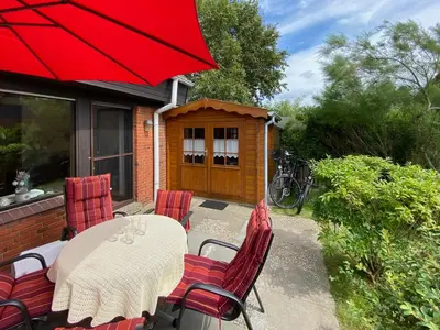 Ein Garten an der Unterkunft Ferienhaus 
