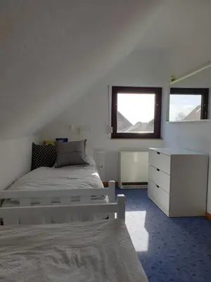 Ein Bett oder Betten in einem Zimmer der Unterkunft Ferienhaus 