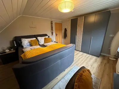 Ein Bett oder Betten in einem Zimmer der Unterkunft Ferienwohnung Herrlichkeit