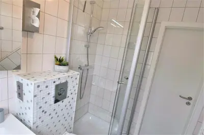 Ein Badezimmer in der Unterkunft Haus Schatz am Meer Appartement 11 Schatzinsel