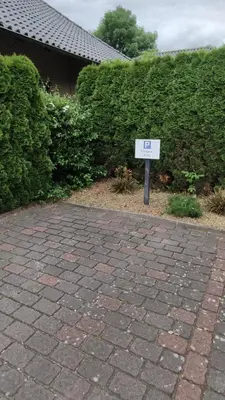 Ein Garten an der Unterkunft FeWoGeestland