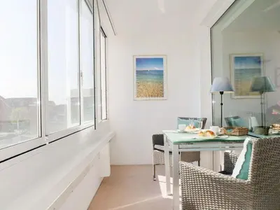 Ein Sitzbereich in der Unterkunft Seedeich Apartment
