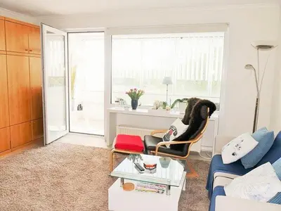 Ein Sitzbereich in der Unterkunft Seedeich Apartment
