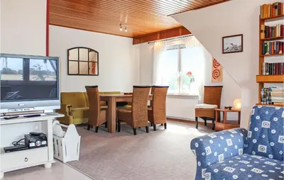 Ein Sitzbereich in der Unterkunft Cozy Apartment In Wurster Nordseeküste