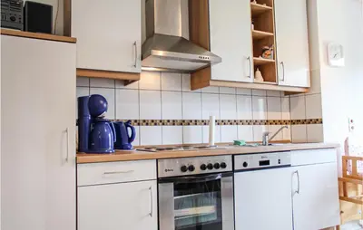 Küche/Küchenzeile in der Unterkunft Cozy Apartment In Wurster Nordseeküste