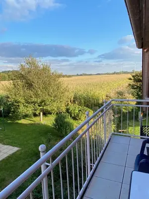 Ein Balkon oder eine Terrasse in der Unterkunft Ferienwohnung am Deichweg