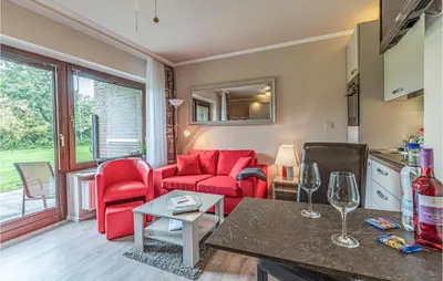Ein Sitzbereich in der Unterkunft Awesome Apartment In Friedrichskoog