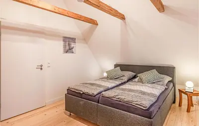 Ein Bett oder Betten in einem Zimmer der Unterkunft 3 Bedroom Cozy Home In Friedrichskoog
