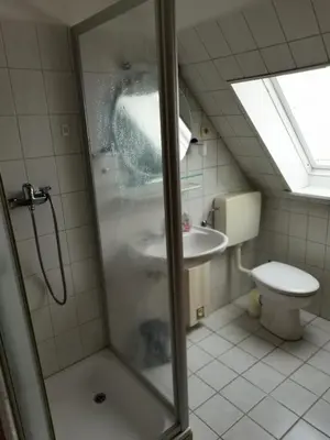 Ein Badezimmer in der Unterkunft Kleine Krabbe