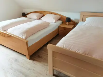 Ein Bett oder Betten in einem Zimmer der Unterkunft Kleine Krabbe