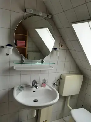 Ein Badezimmer in der Unterkunft Kleine Krabbe