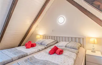 Ein Bett oder Betten in einem Zimmer der Unterkunft Awesome Apartment In Friedrichskoog