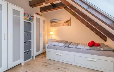 Ein Bett oder Betten in einem Zimmer der Unterkunft Awesome Apartment In Friedrichskoog