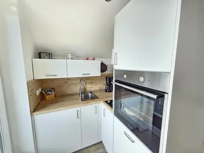 Küche/Küchenzeile in der Unterkunft Appartementhaus Kogge Wohnung 9