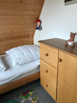 Ein Bett oder Betten in einem Zimmer der Unterkunft Nordsee Ferienhaus Diemel