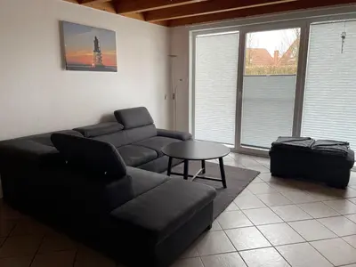 Ein Sitzbereich in der Unterkunft Nordsee Ferienhaus Diemel