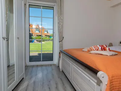 Ein Bett oder Betten in einem Zimmer der Unterkunft Ferienwohnung Wattfinca