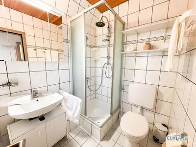 Ein Badezimmer in der Unterkunft Ferienhaus am Ringwall 8