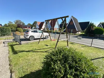 Ein Kinderspielbereich in der Unterkunft Ferienhaus am Ringwall 8