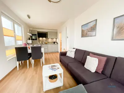 Ein Sitzbereich in der Unterkunft Haus Windjammer Duhnen Wohnung 15