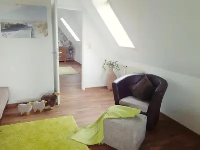 Ein Sitzbereich in der Unterkunft Deichgeflüster - An de Warft