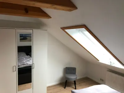 Ein Bett oder Betten in einem Zimmer der Unterkunft Heimathafen - Ferienwohnung Verse