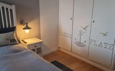 Ein Bett oder Betten in einem Zimmer der Unterkunft Ferienwohnung Wattkieker