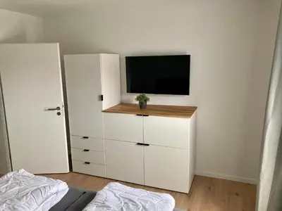 Ein Bett oder Betten in einem Zimmer der Unterkunft Ferienwohnung Hohe Lith