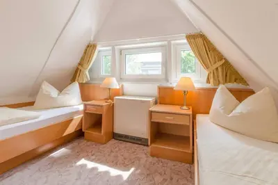 Ein Bett oder Betten in einem Zimmer der Unterkunft Landhaus Braband Ferienhaus ohne WLAN - Christian-Brütt-Weg