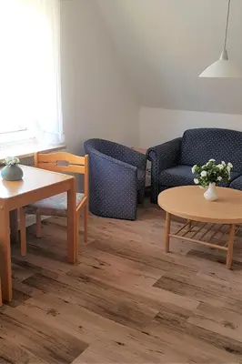 Ein Sitzbereich in der Unterkunft Landhaus Braband Ferienwohnungen - Gustav-Schönleber-Weg 2