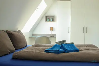 Ein Bett oder Betten in einem Zimmer der Unterkunft Residenz Mühlentrift Wohnung 10