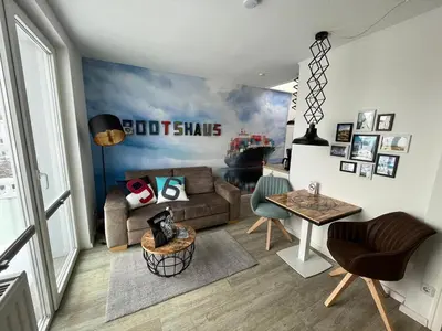 Ein Sitzbereich in der Unterkunft Bootshaus Appartements