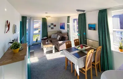 Ein Sitzbereich in der Unterkunft Ferienwohnung Gooß im Haus Pavillon