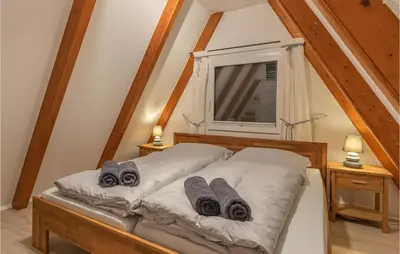 Ein Bett oder Betten in einem Zimmer der Unterkunft Stunning Home In Friedrichskoog