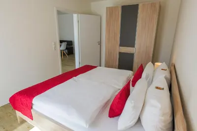 Ein Bett oder Betten in einem Zimmer der Unterkunft Hotel Hafen Büsum