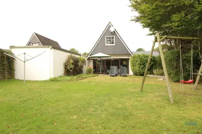 Ein Garten an der Unterkunft Ferienhaus Christian Brütt Weg 23