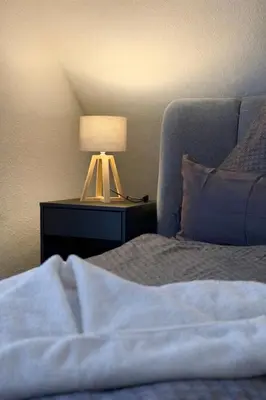 Ein Bett oder Betten in einem Zimmer der Unterkunft Pension Holter Deel