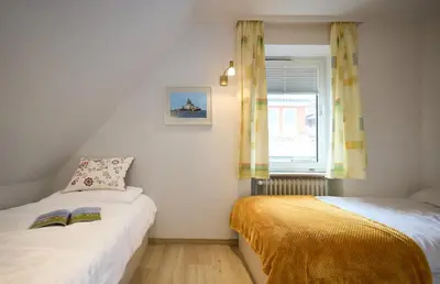 Ein Bett oder Betten in einem Zimmer der Unterkunft Villa Sonnenschein