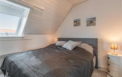 Ein Bett oder Betten in einem Zimmer der Unterkunft Stunning Apartment In Friedrichskoog