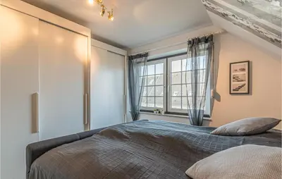 Ein Bett oder Betten in einem Zimmer der Unterkunft Stunning Apartment In Friedrichskoog